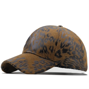 Stylish faux leopard print baseball cap featuring textured fabric and curved brim