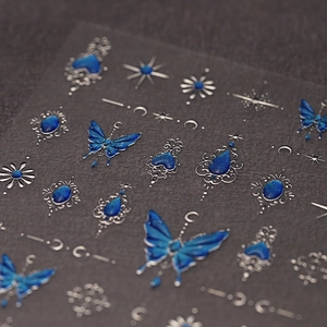 Gothic blue and silver butterfly nail stickers with star and moon art designs