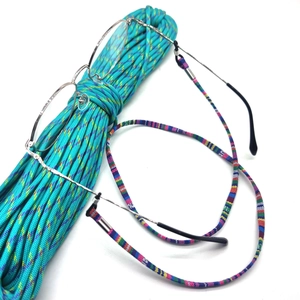 Ethnic style woven eyeglass strap with colorful pattern and non-slip silicone loops