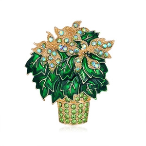 Detailed macro view of dragonfly brooch featuring green enamel and vibrant rhinestones