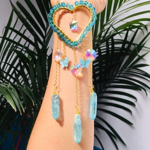 Golden heart suncatcher sun catcher with blue crystal drops and hanging butterfly charms