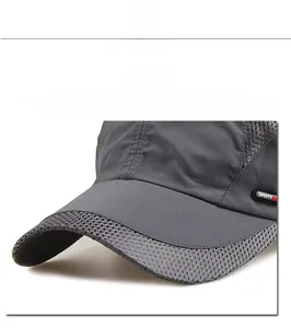 Detailed close-up of dark grey mesh baseball cap brim featuring Sports embroidery