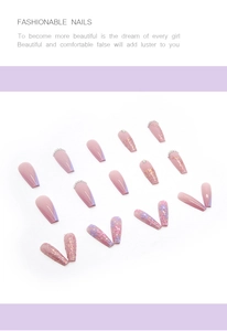 Detail of pink and purple coffin press-on nails with glitter, floral art and rhinestones
