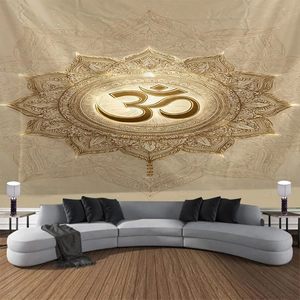 Detail of golden Om symbol and mandala patterns on a decorative wall hanging tapestry
