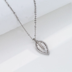 Macro shot of S925 sterling silver leaf pendant with pave-set marquise and round zircons