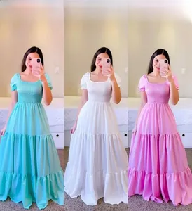 Detailed tiered design and smocked bodice of floral off-shoulder maxi summer dress