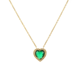 Detailed macro view of heart-shaped green zircon pendant with 18k gold-plated link chain