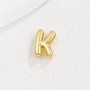 Detail view of 3D gold-plated letter K charm for 10mm DIY bracelet making