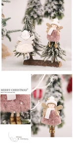 Detail of plush Christmas angel doll ornaments in pink and beige on a tree