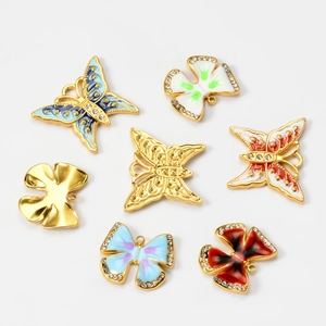 Colorful enamel butterfly pendants with rhinestones in various vibrant finishes