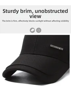 Detailed macro view of black baseball cap with firm brim and metal side plate decoration