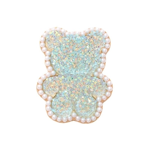 Sparkling acrylic bear charm with iridescent rhinestones and white pearl border decor