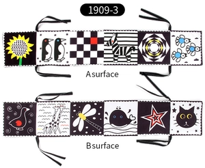 Detailed view of dual-sided black and white high contrast infant soft book patterns