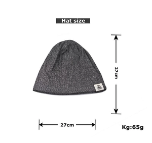 Detailed view of gray knit beanie with size specs and Tinkly embroidered label
