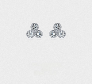 Detailed view of S925 silver stud earrings featuring a classic triple-cluster zircon design