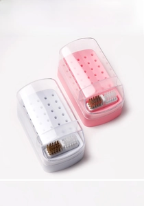Detailed view of 30-hole nail drill bit storage box with integrated cleaning brushes
