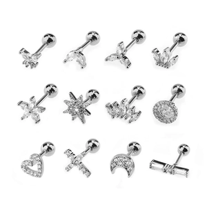 Set of 12 silver stud earrings with zirconia stones in heart, star, and crown shapes
