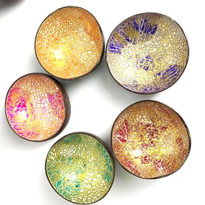Five colorful coconut bowls with shell inlay for home decoration and candy storage