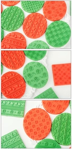 Detailed relief textures of Christmas tree and snowflake patterns on fondant icing