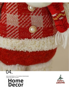 Detail of a Christmas plush ornament featuring red plaid fabric and pearl button accents