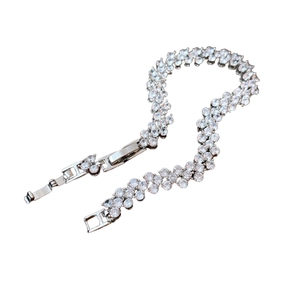 Silver bracelet with shimmering cubic zirconia stones and a secure folding clasp closure