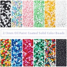 Close-up of 2/3mm oil-painted seed beads in twelve vibrant color schemes for DIY jewelry