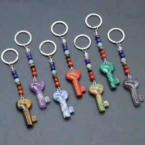 Natural crystal heart key shape keychains featuring assorted healing stones and colorful beads