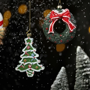 Christmas tree and wreath hanging ornaments with snowflake texture on dark bokeh background