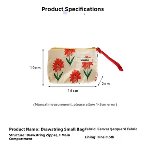 Detailed canvas cosmetic bag with red floral pattern and dimensions 16x10x2cm