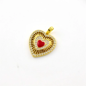 Gold-plated heart pendant with clear zircon border and red enamel center on white background
