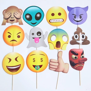 Detail view of 12 gold-stamped Emoji handheld photo props for Halloween party photo booths
