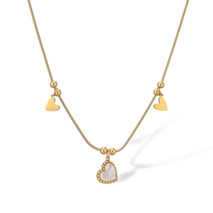 Gold snake chain necklace featuring white shell heart pendant and two golden heart charms