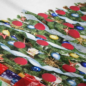 Detailed macro view of soft Christmas fabric texture with festive tree and gift box patterns