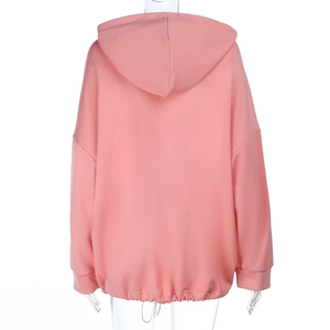 Rear view of a pink oversized hoodie with drawstring hem and dropped shoulders