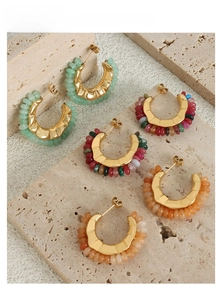 Detailed view of vintage C-shape gold-plated hoop earrings with colorful natural stones