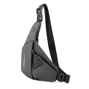 Detail view of water-resistant gray crossbody bag with earphone port and adjustable buckle