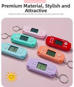 Close-up of colorful mini handheld game console keychains made of high quality ABS