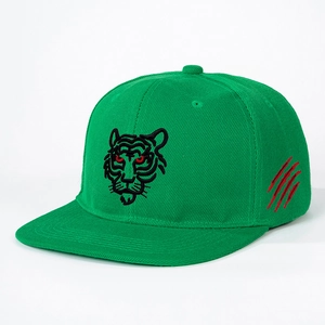 Detail of green flat brim cap with tiger embroidery and red scratch marks on the side