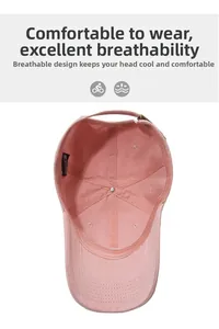 Detail view of pink cotton baseball cap interior showing breathable 6-panel structure