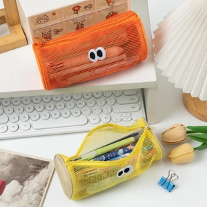 Detail of colorful mesh pencil cases with cartoon eyes and large storage capacity