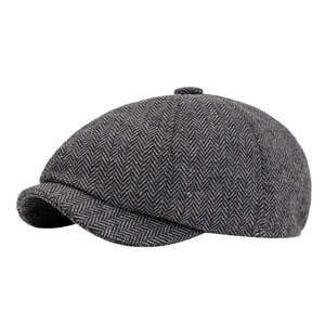 Classic grey herringbone newsboy cap for men featuring a vintage wool blend texture