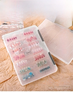 Detailed view of clear 24cm acrylic nail art organizer case with double-sided storage