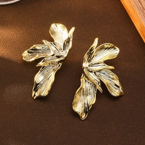 Luxurious gold lily flower stud earrings with detailed brushed metal texture for women