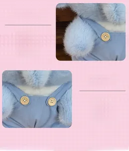 Detail showing the fine stitching and corduroy overalls with buttons on the plush elephant