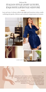 Detail of dark blue satin robe showing glossy silk texture and waist tie design