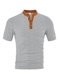 Macro detail of men's grey knit shirt with brown contrast collar and four button placket