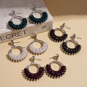 Retro geometric hollow leather wrapped round hoop earrings in four assorted colors