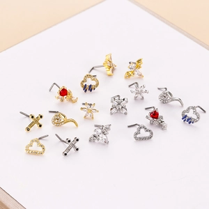 L-shaped stainless steel nose studs featuring cross, star, and heart zircon designs