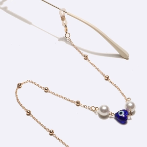 Golden eye chain with white pearls and blue evil eye heart pendant for glasses