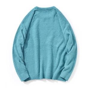 Rear view of loose fit blue chenille knit sweater with textured fabric and crew neck